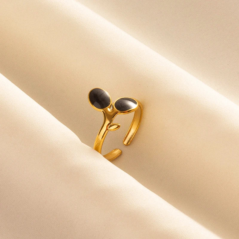 ŒIL DE FEU – Bague en acier inoxydable plaqué or avec émail noir